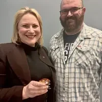 Two people standing together