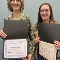 Two people standing together