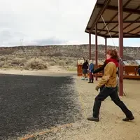 student throws javelin