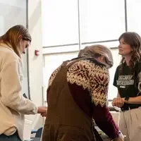 Students gather to sign thank you notes at Giving Day