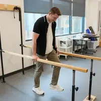 Austin showing examples of movements in physical therapy