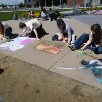 Students work on chalk art