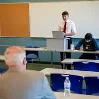 Student presents to a judge