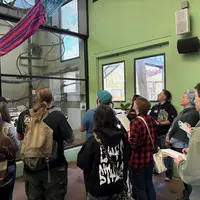 Students observing primates at the Zoo