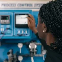 Student working on a piece of Mechatronics equipment