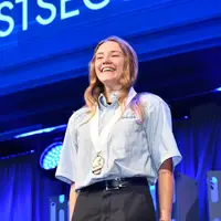 Autumn Harvey wearing her medal