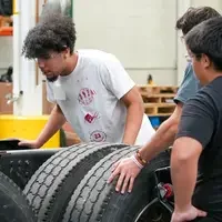 Students working on Heavy-Duty Truck equipment