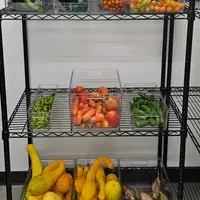 Shelves of the food pantry with fresh produce