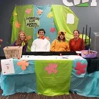 Four people dressed as scooby doo characters