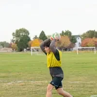 Soccer player throwing ball