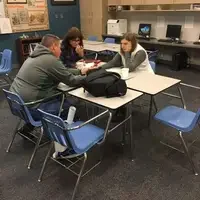 Students in a classroom working together 