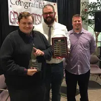 Luke Yeates, Jim Gatfield, and Johnny Rowing at Communication graduate celebration
