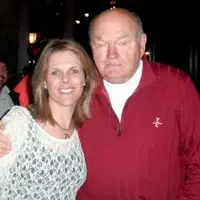 CWI alumna, Lynne Wieland, with Warren Miller