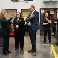 The Provost of CWI speaks with Idaho State Representatives at the Micron Education Center.