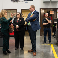 The Provost of CWI speaks with Idaho State Representatives at the Micron Education Center.