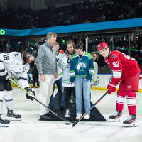 The puck drop at a hockey game.