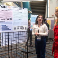 Students, faculty, staff, and more participate in a showcase of student presentations and art.