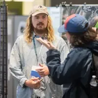 Students, faculty, staff, and more participate in a showcase of student presentations and art.