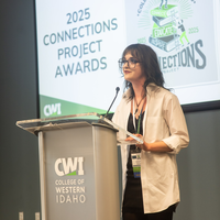 Students, faculty, staff, and more participate in a showcase of student presentations and art.