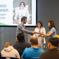 Students, faculty, staff, and more participate in a showcase of student presentations and art.