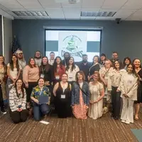 Students, faculty, staff, and more participate in a showcase of student presentations and art.