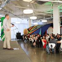 Attendees enjoy and celebrate the achievements of students at a college awards banquet.
