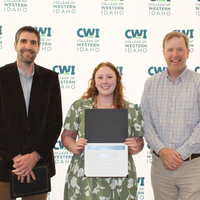 Attendees enjoy and celebrate the achievements of students at a college awards banquet.