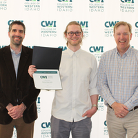 Attendees enjoy and celebrate the achievements of students at a college awards banquet.