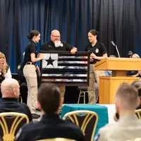 Photos from a graduation ceremony for Law Enforcement officers. 