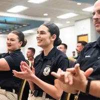 Photos from a graduation ceremony for Law Enforcement officers. 