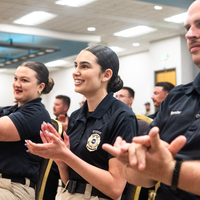 Photos from a graduation ceremony for Law Enforcement officers. 