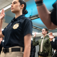 Photos from a graduation ceremony for Law Enforcement officers. 
