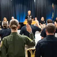Photos from a graduation ceremony for Law Enforcement officers. 