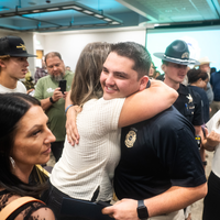 Photos from a graduation ceremony for Law Enforcement officers. 