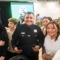 Photos from a graduation ceremony for Law Enforcement officers. 