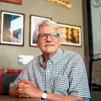 A man poses for a portrait.