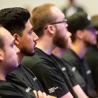 An apprenticeship graduation and signing event