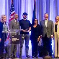 An apprenticeship graduation and signing event
