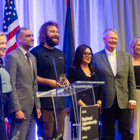 An apprenticeship graduation and signing event