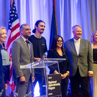 An apprenticeship graduation and signing event