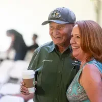 Faculty and staff from a college attend and annual event.