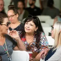 Faculty and staff from a college attend and annual event.