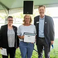 Faculty and staff from a college attend and annual event.