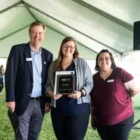 Faculty and staff from a college attend and annual event.