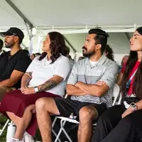 Faculty and staff from a college attend and annual event.