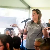 Faculty and staff from a college attend and annual event.