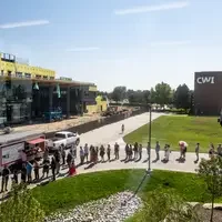 Faculty and staff from a college attend and annual event.