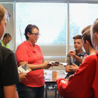 Anthropology Club President, Anne VanWassenhove, with Adventure Club participants