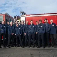 Student firefighters and CWI officials at a Fire Service Technology program press event announcing a $75k grant from Metallica.