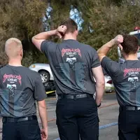 Student firefighters and CWI officials at a Fire Service Technology program press event announcing a $75k grant from Metallica.